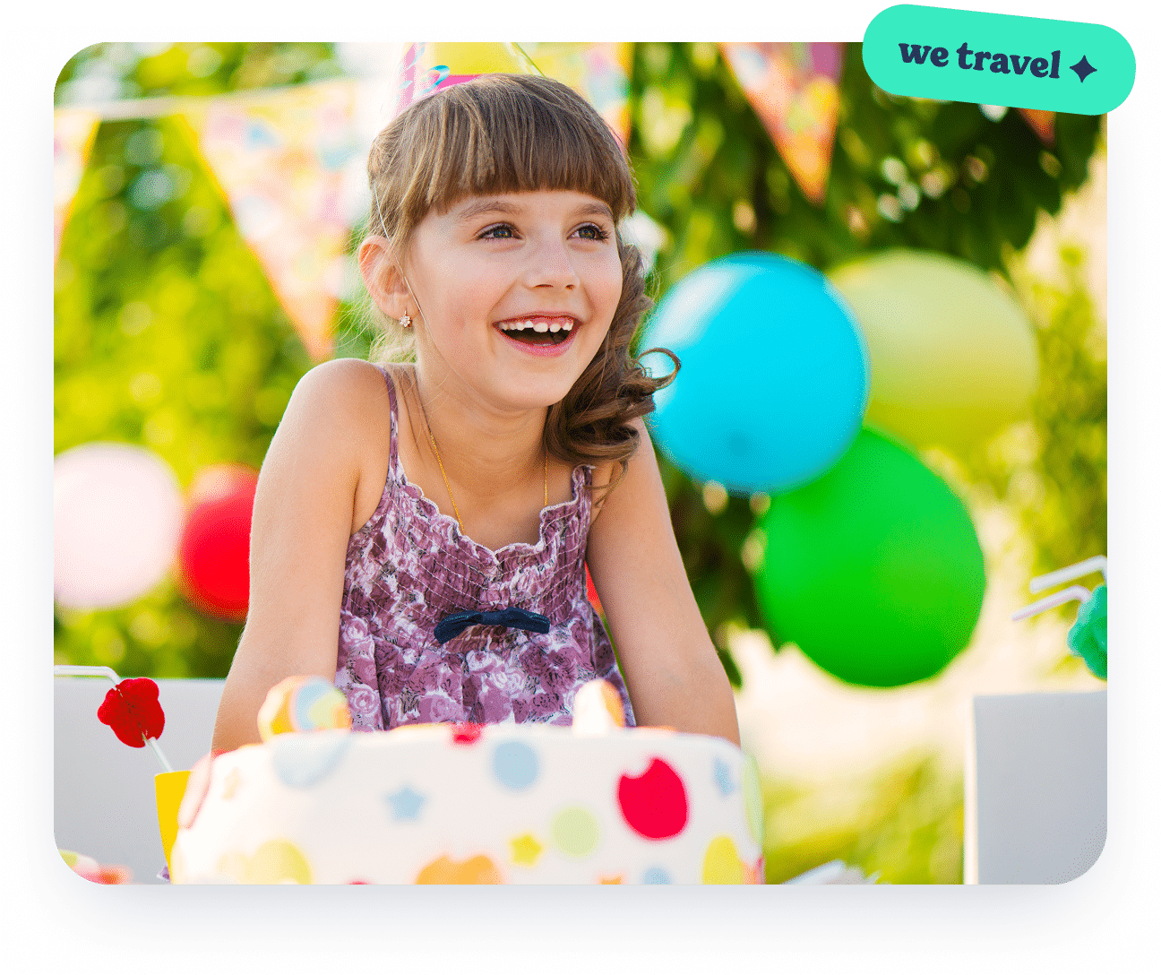 Young child celebrating her birthday party outdoors